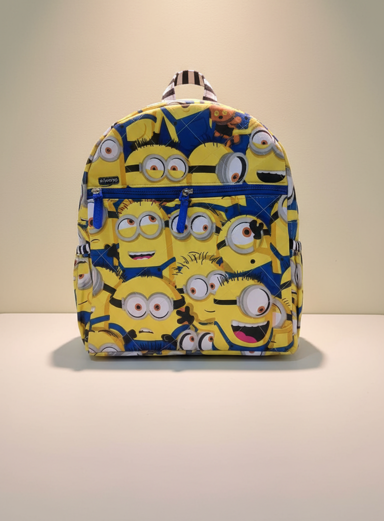 Kids’ Bright Yellow Minions Print Quilted Fabric Backpack – Fun School Bag with Black & White Striped Straps